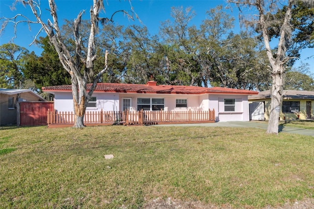 view of front of home with a front lawn