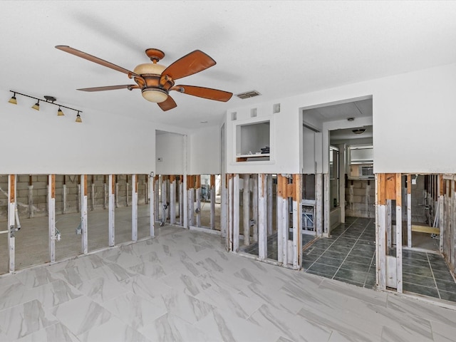 spare room featuring ceiling fan