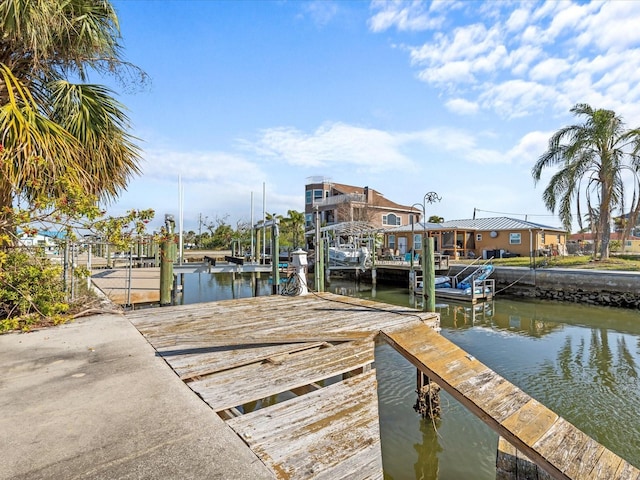 dock area featuring a water view