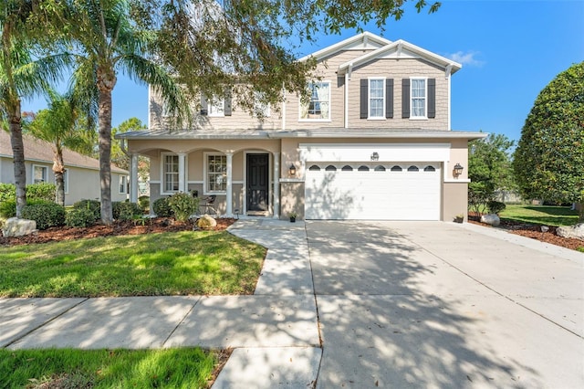 view of front of home with a garage, a porch, and a front lawn