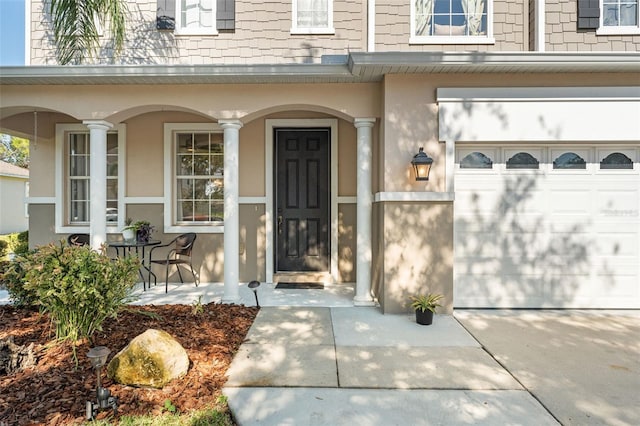 property entrance with covered porch