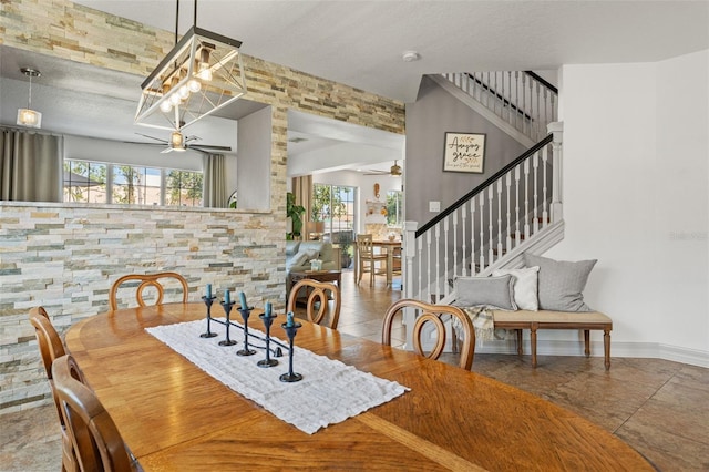 dining room featuring tile patterned floors and ceiling fan