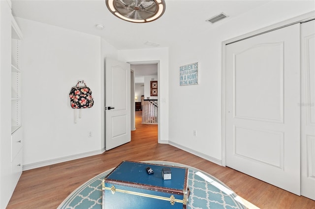 bedroom featuring hardwood / wood-style floors