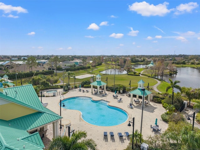 view of pool with a gazebo, a patio area, and a water view