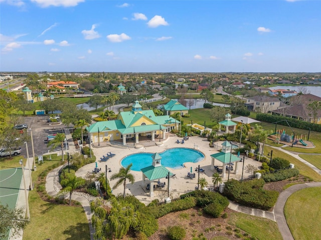 view of swimming pool with a gazebo, a water view, and a patio area