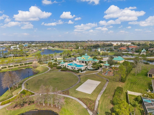 birds eye view of property with a water view