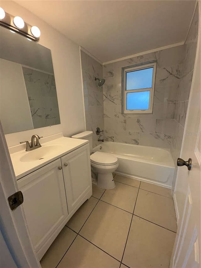 full bathroom with vanity, toilet, and tiled shower / bath