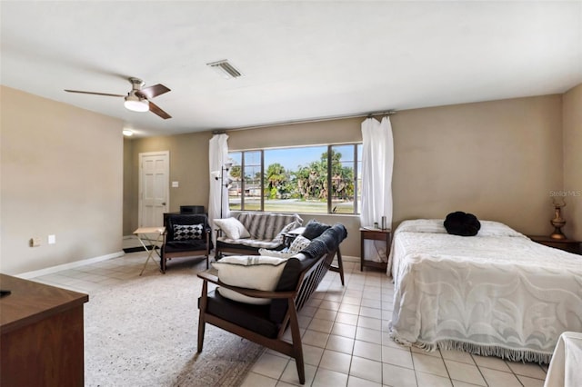 bedroom with light tile patterned floors, baseboards, visible vents, and a ceiling fan