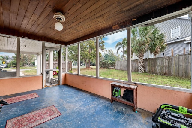 sunroom / solarium with wood ceiling