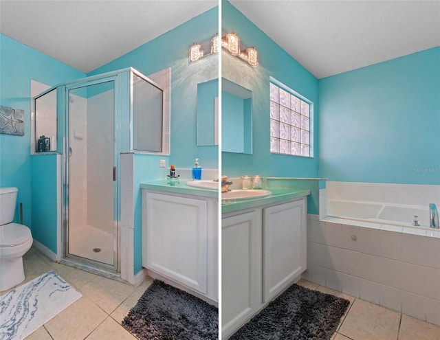 full bathroom featuring vanity, tile patterned floors, toilet, and separate shower and tub