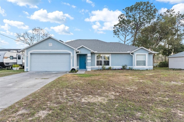 single story home with a garage and a front yard