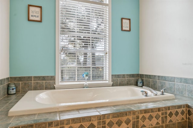 bathroom featuring tiled bath