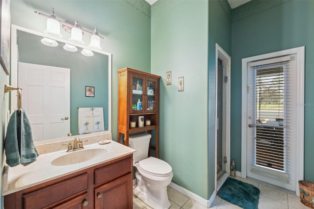 bathroom featuring walk in shower, tile patterned floors, toilet, and vanity