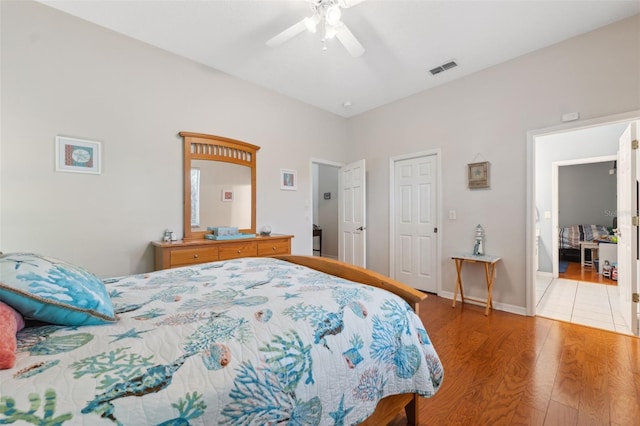 bedroom featuring hardwood / wood-style flooring and ceiling fan