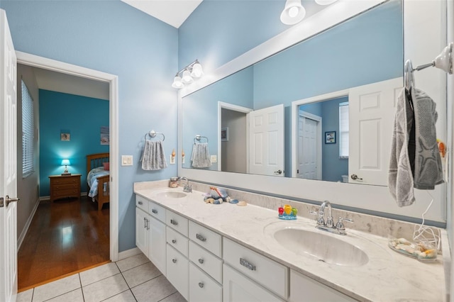 bathroom featuring tile patterned floors and vanity