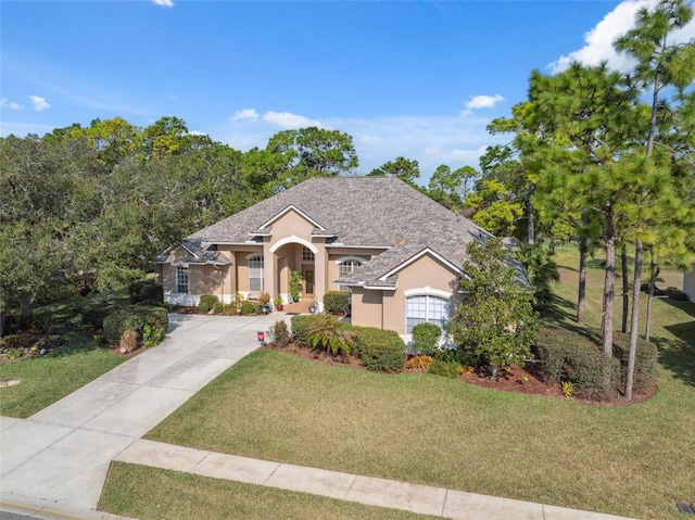 view of front of house with a front lawn