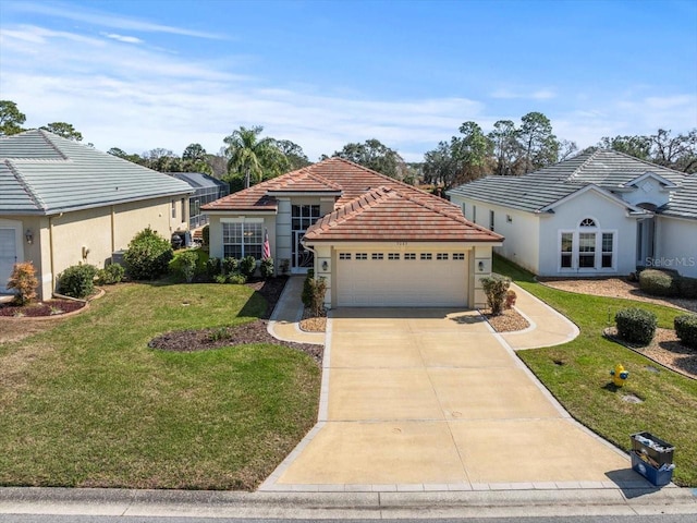 ranch-style home featuring a garage and a front lawn