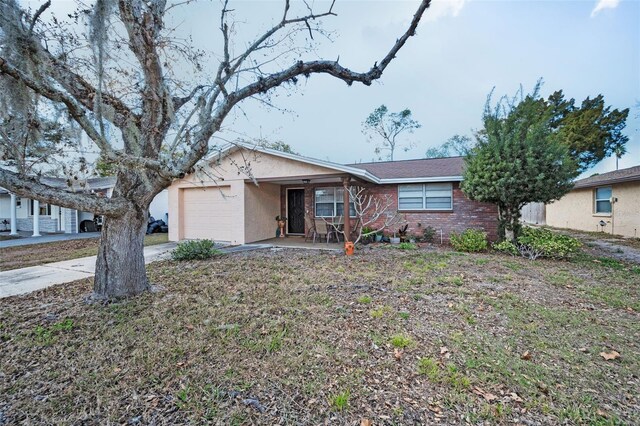 ranch-style home with a garage