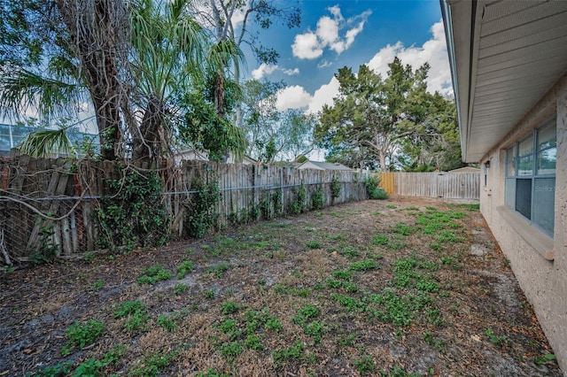 view of yard featuring a fenced backyard