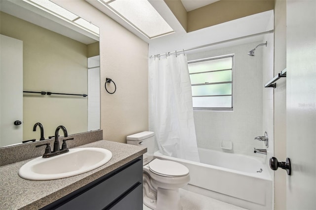 full bathroom featuring shower / bath combo, vanity, and toilet