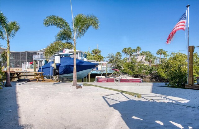 view of community featuring a boat dock