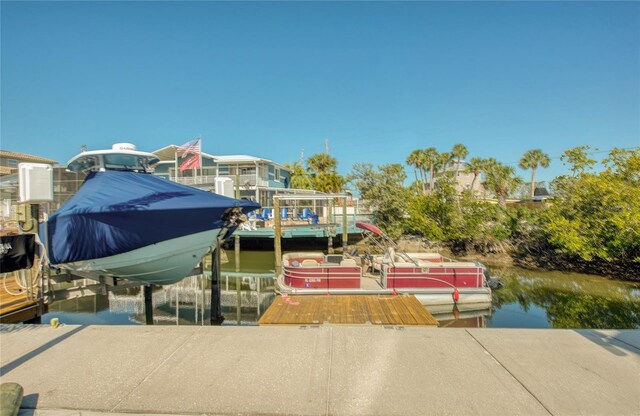 view of dock featuring a water view