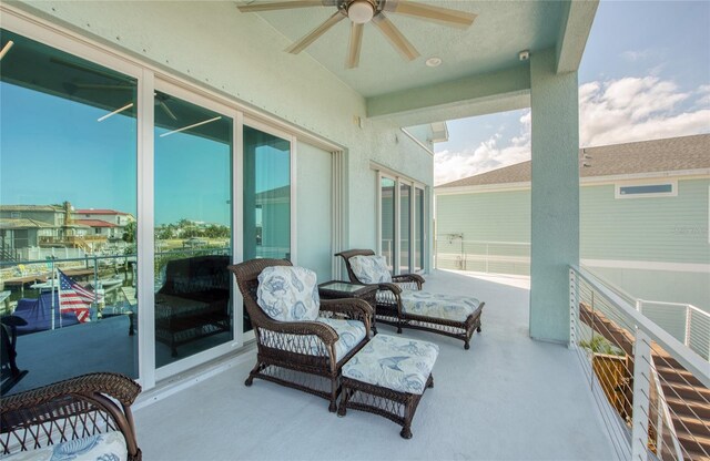 exterior space featuring ceiling fan