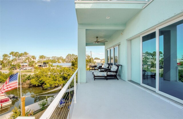 balcony featuring ceiling fan