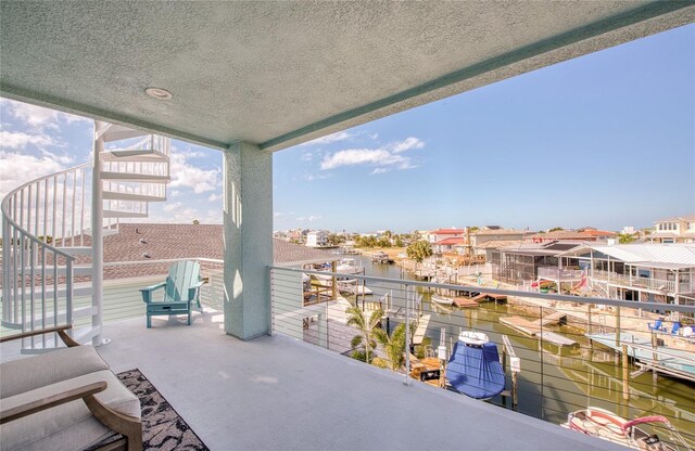 view of patio / terrace with a balcony