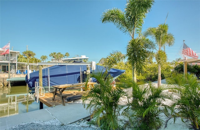 6613 Josie Ln, Hudson, FL 34667 - dock featuring boat lift