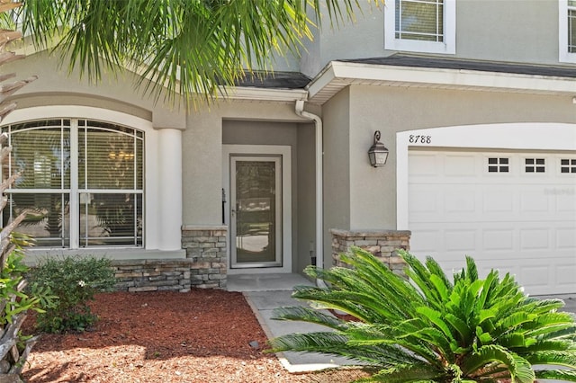 doorway to property featuring a garage