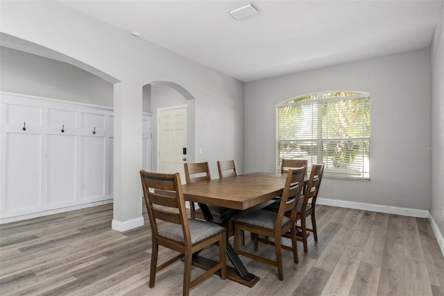 dining room with light wood-type flooring