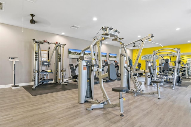 gym with light hardwood / wood-style floors