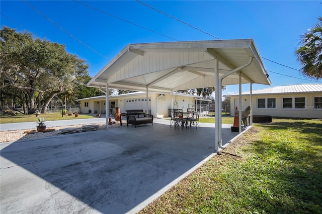 view of patio with a garage