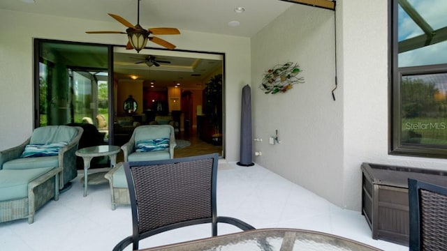 view of patio / terrace with ceiling fan