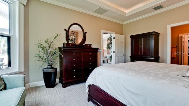 bedroom with crown molding and light colored carpet