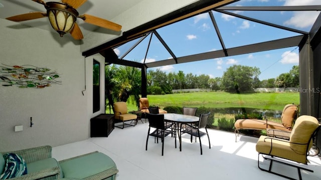 view of patio featuring a water view and an outdoor hangout area