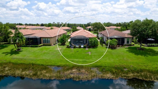 drone / aerial view featuring a water view