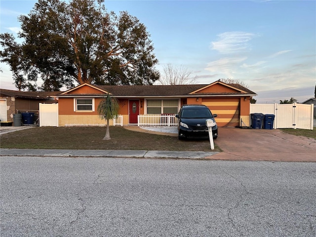 single story home featuring a garage