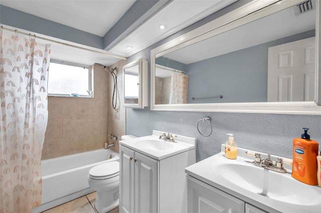 bathroom with tile patterned flooring, toilet, visible vents, vanity, and shower / tub combo with curtain