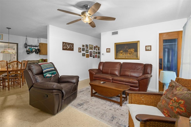 living room featuring ceiling fan