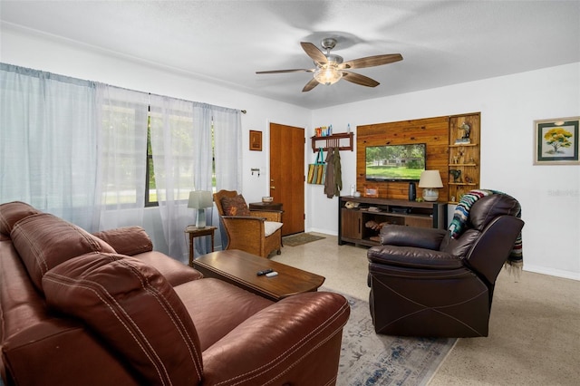 living room with ceiling fan