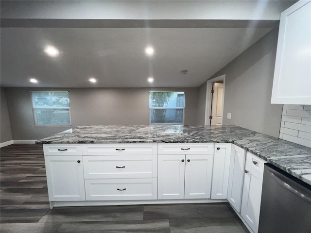 kitchen with dishwasher, white cabinets, and stone countertops