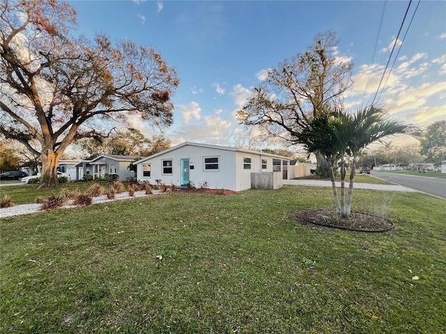 exterior space with a yard