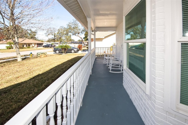 balcony featuring a porch