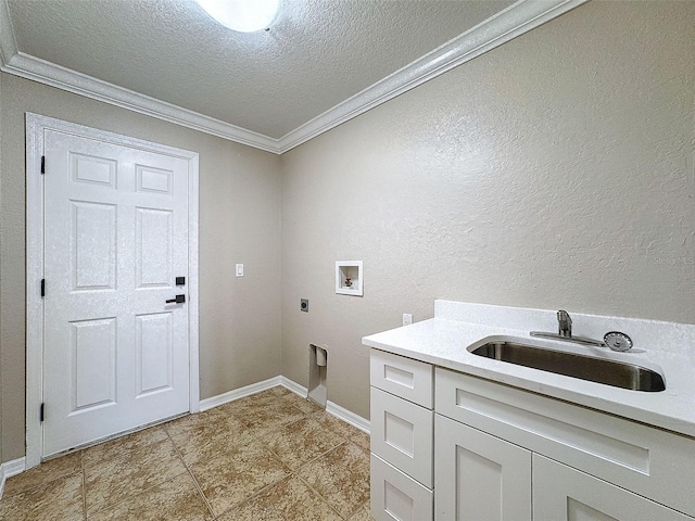 laundry area featuring washer hookup, crown molding, electric dryer hookup, sink, and cabinets