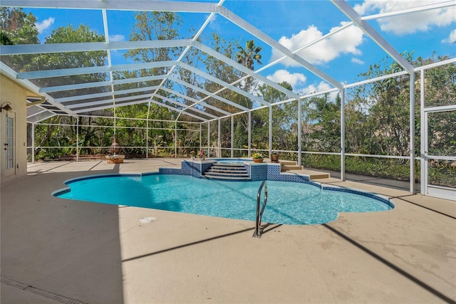 view of pool featuring a lanai and a patio area