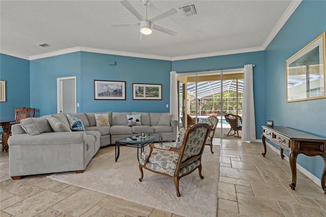 living area featuring stone tile floors, visible vents, ornamental molding, and ceiling fan