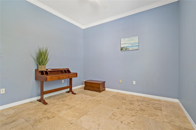 spare room with baseboards and crown molding