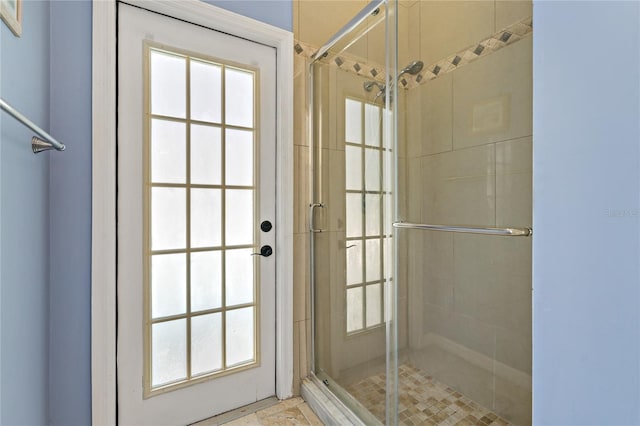 bathroom featuring a shower stall